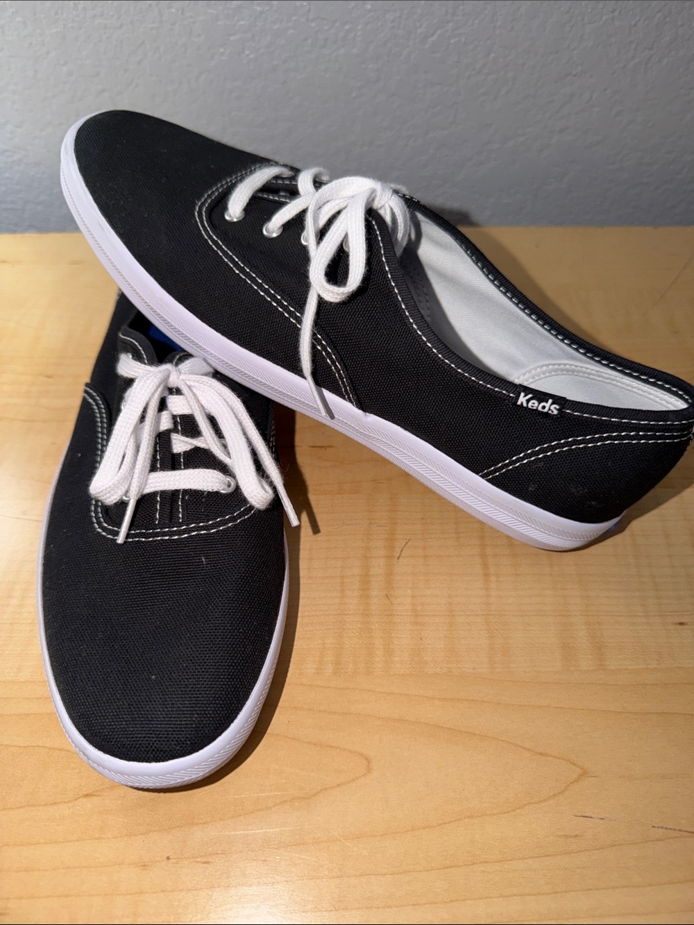 Keds Women's Champion Black Canvas Sneaker, featuring Softerra insoles